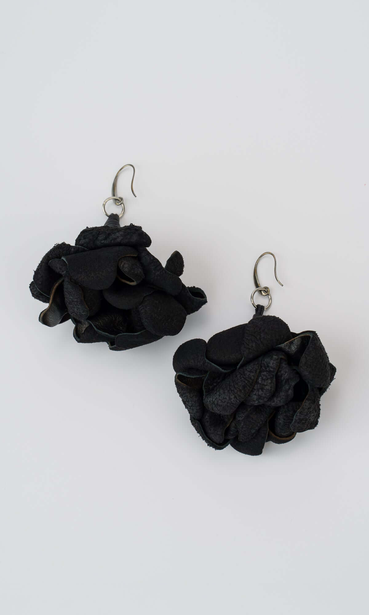 Boucles d’oreilles à pendentif rose en cuir