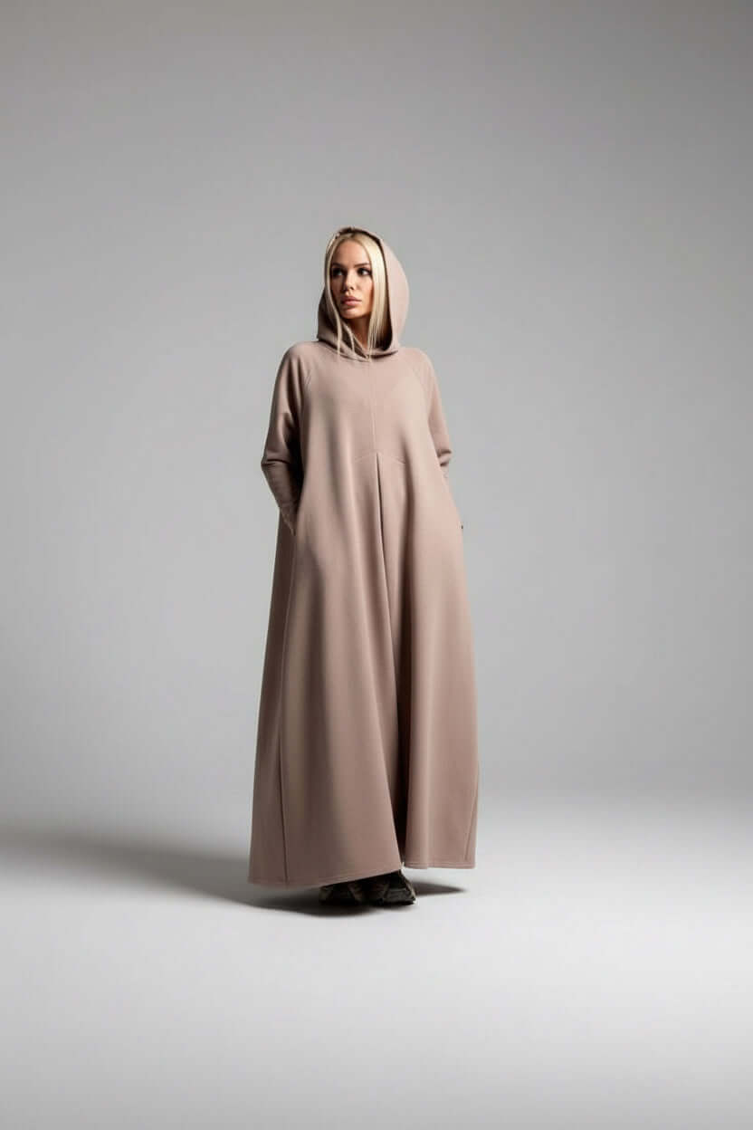Person wearing maxi cotton hooded dress