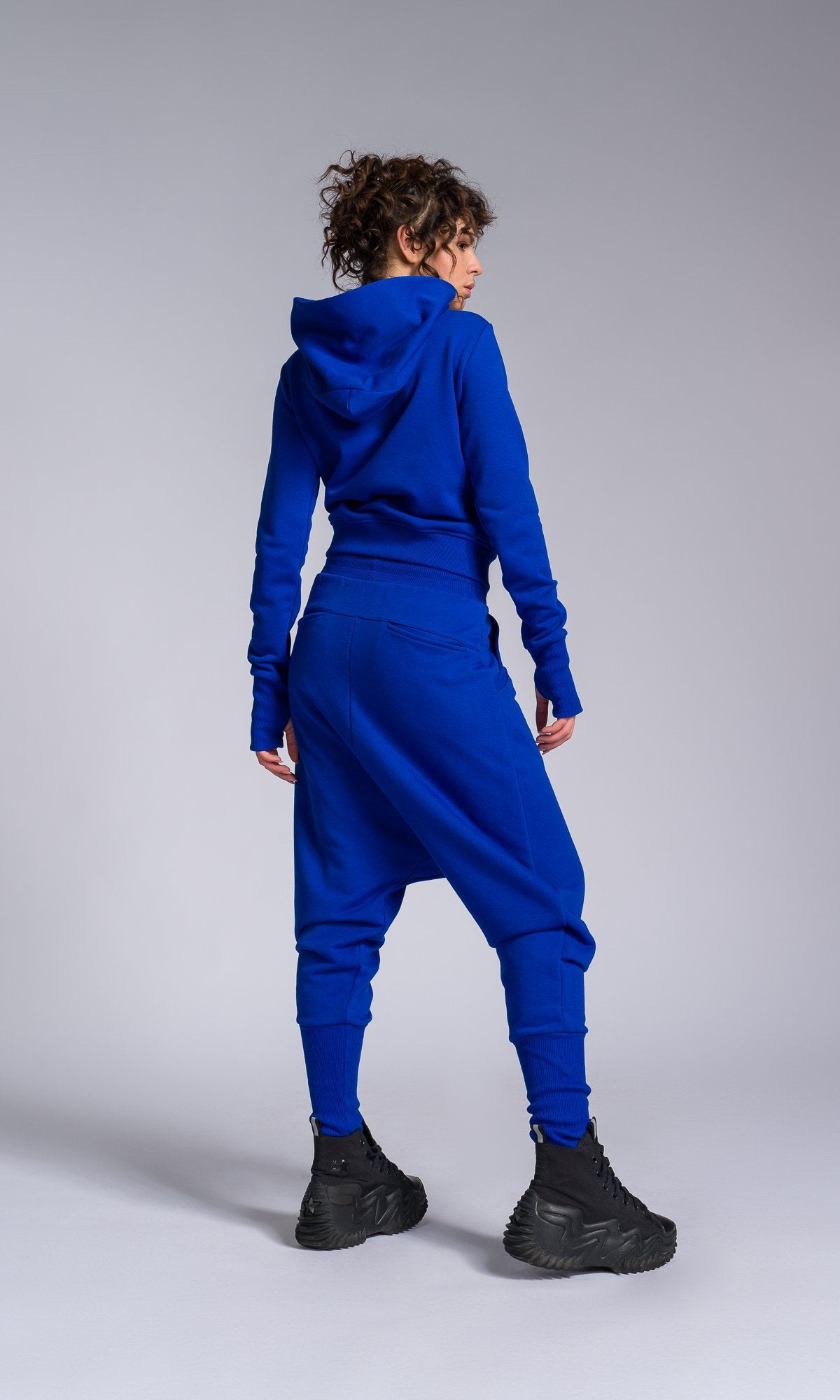 Two-piece Set of Deep Drop Crotch Pants and Asymmetric Short Hoodie - AAKASHA