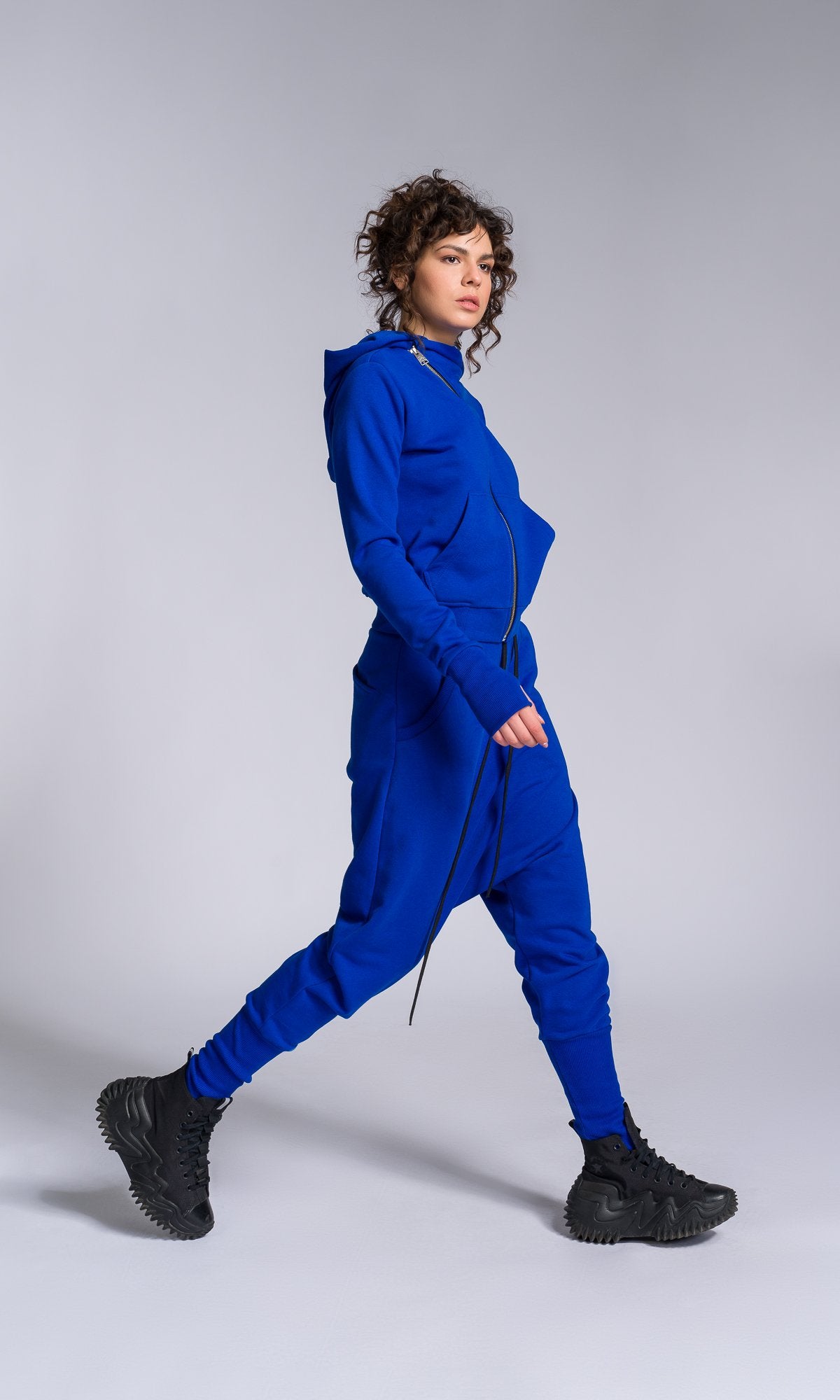 Two-piece Set of Deep Drop Crotch Pants and Asymmetric Short Hoodie - AAKASHA