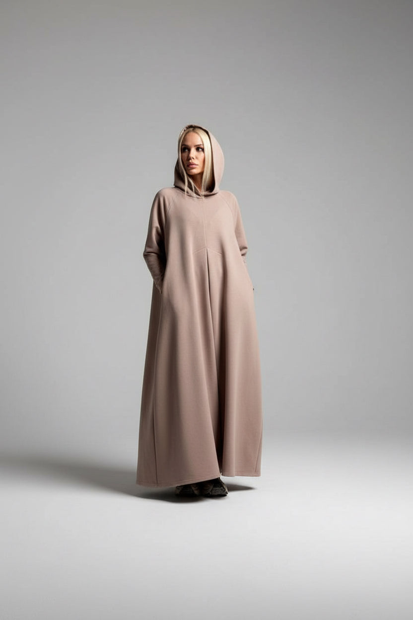 Person wearing maxi cotton hooded dress